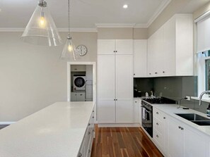 Microwave, stovetop, coffee/tea maker, cookware/dishes/utensils