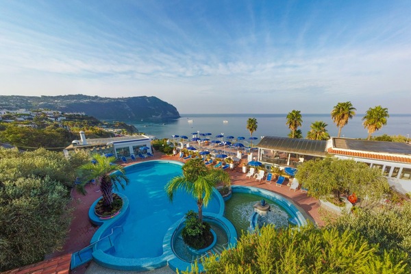 Indoor pool, outdoor pool, pool umbrellas, sun loungers