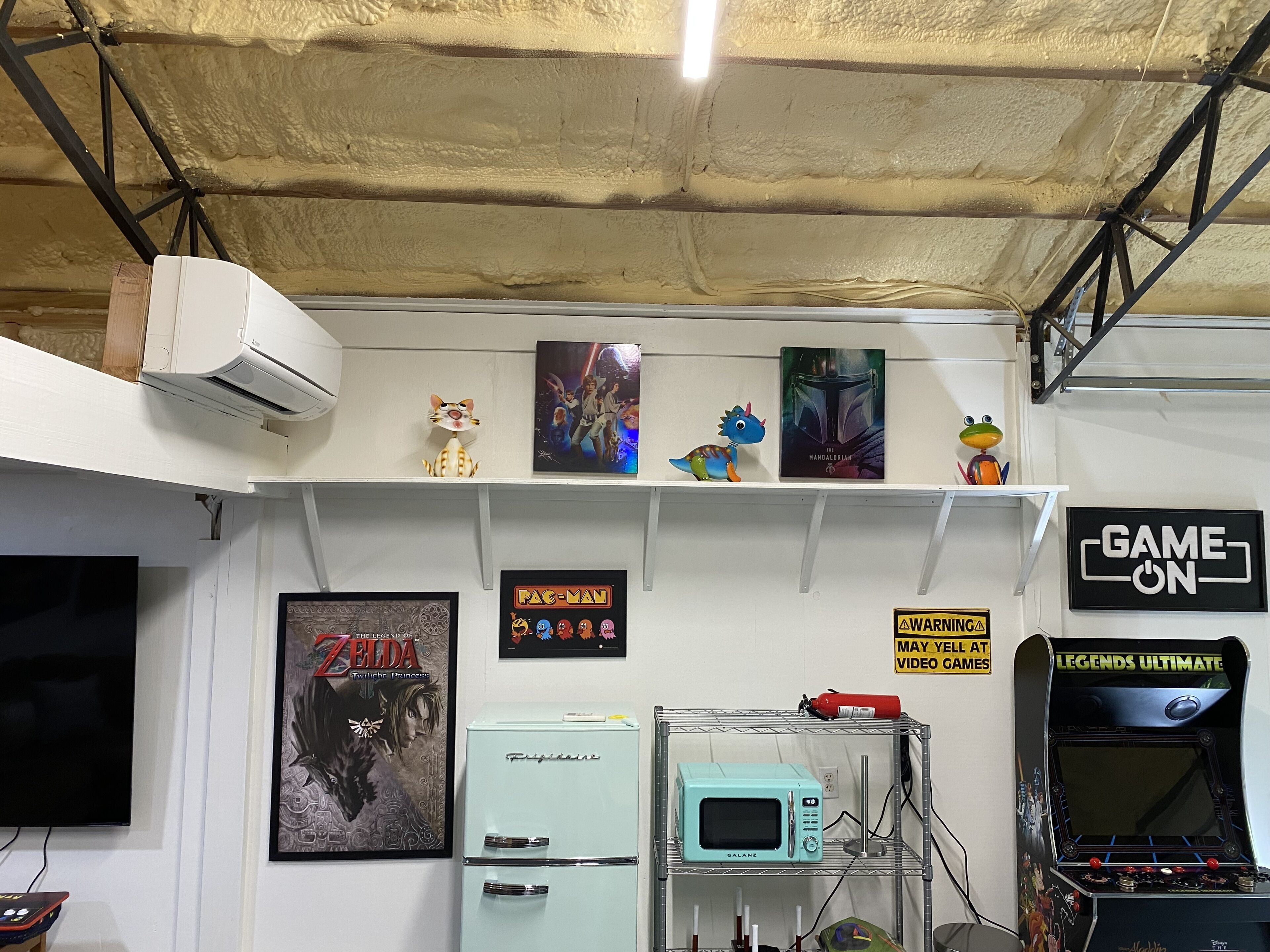 There's a refrigerator & microwave oven in the game room. It's heated and cooled