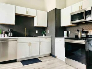 Fridge, microwave, oven, dishwasher - Leaning House of Haynie B| Spacious 2BR/1BA Apt (Evansville)