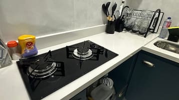 Apartamento | Cozinha privada | Geladeira, micro-ondas, liquidificador