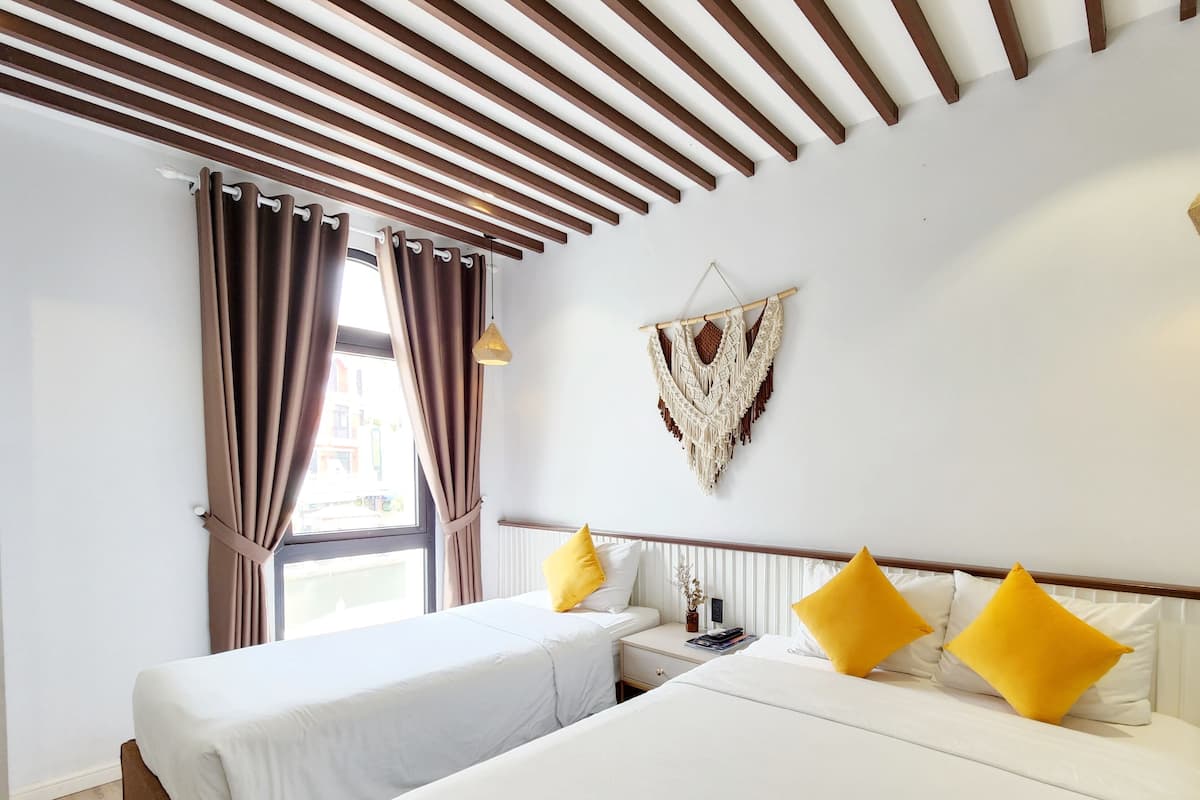 Pillow-top beds, desk, blackout curtains, soundproofing