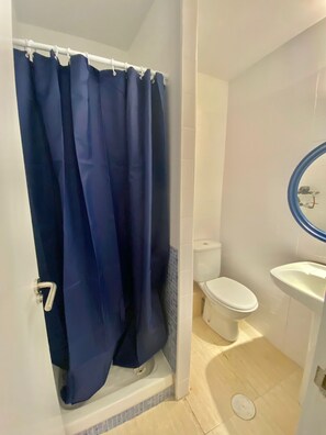 Hair dryer, towels, soap, shampoo