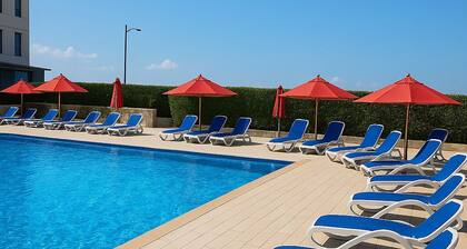 Warmth, Comfort, and Sea Views Porto Said Stay