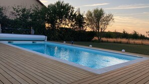 Alberca al aire libre y alberca climatizada