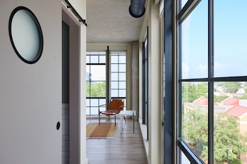 Room, 1 King Bed, Corner | Desk, travel crib, free WiFi, bed sheets at Moxy Charleston Downtown