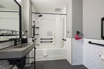 Shower, rainfall showerhead, free toiletries, hair dryer at Moxy Charleston Downtown