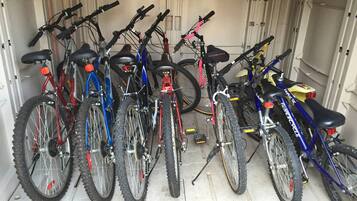 A row of bicycles parked inside a vehicle.