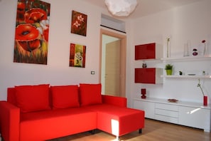 Departamento, 2 habitaciones, para fumadores, balcón | Área de sala de estar