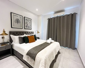 Condo com design assinado | 1 quarto, Wi-Fi de cortesia, roupa de cama