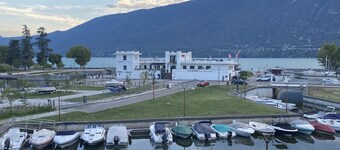 Superb apartment in small harbor with lake and marina views.