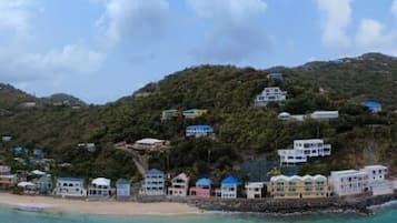 On the beach, sun-loungers, beach towels