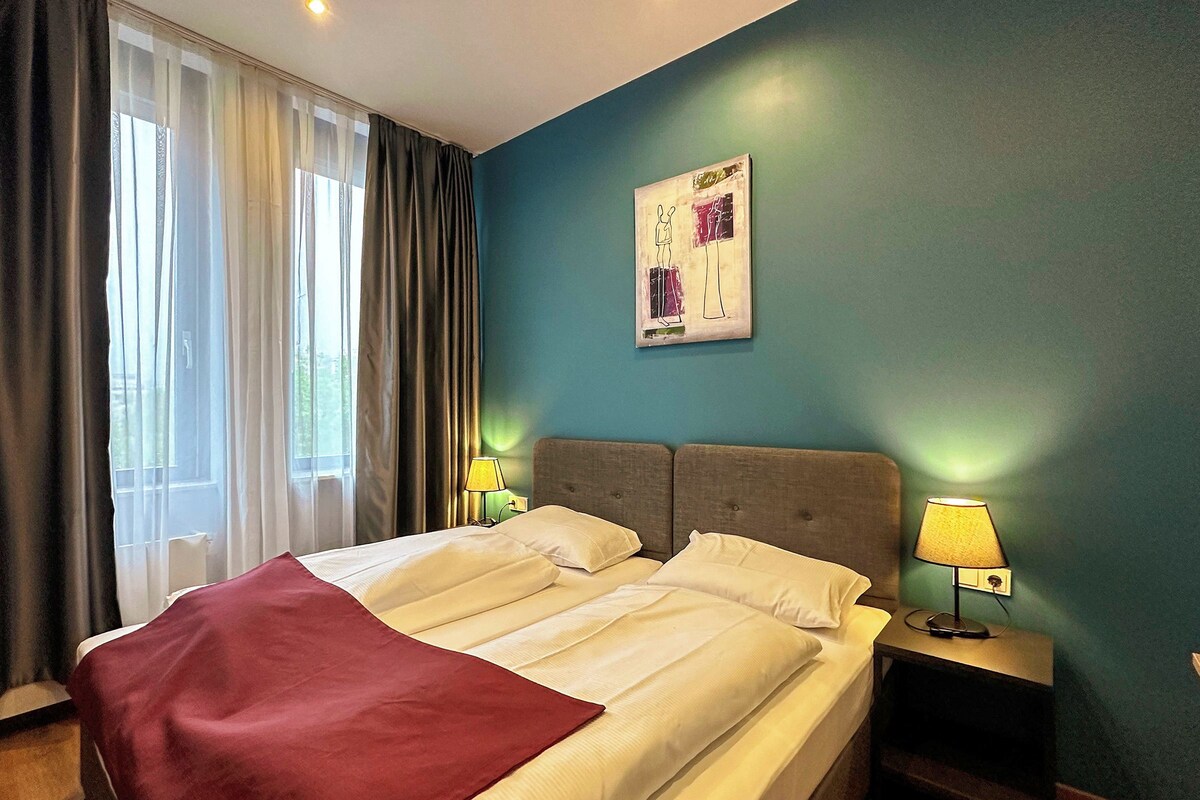 Premium bedding, soundproofing, iron/ironing board (on request)
