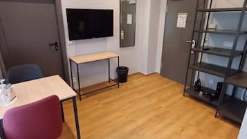 Standard Single Room | Living area | Smart TV