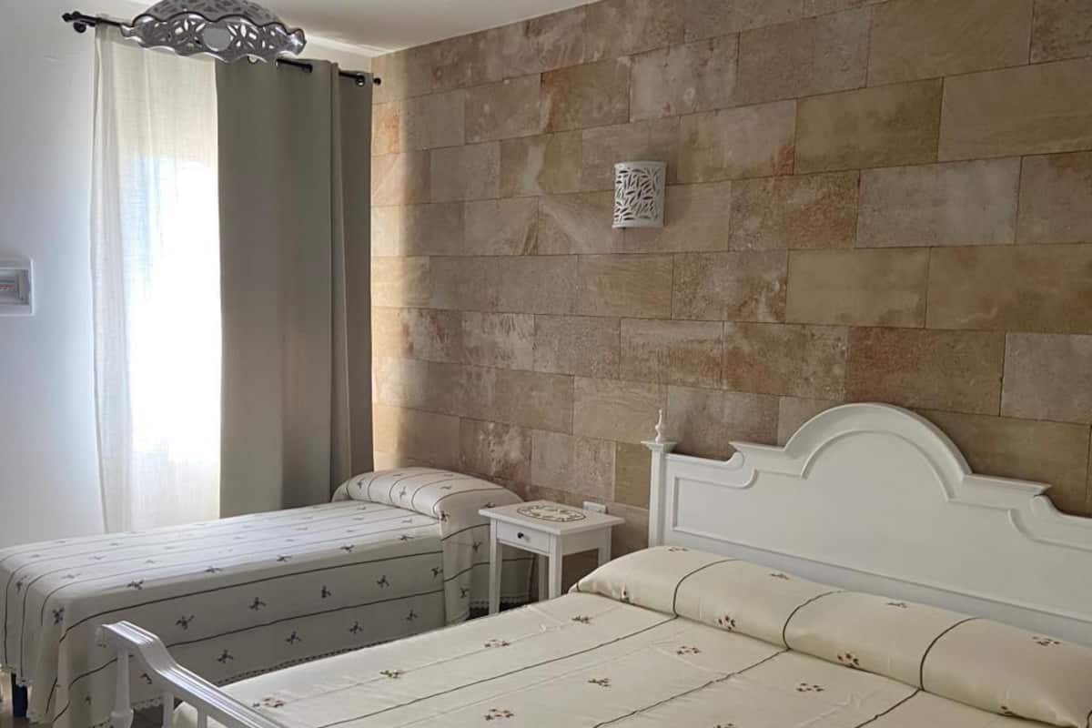 Blackout curtains, soundproofing, free WiFi, bed sheets