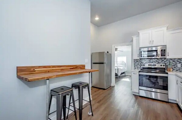 Microwave, stovetop, kitchen islands