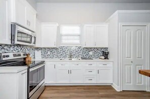 Microwave, stovetop, kitchen islands