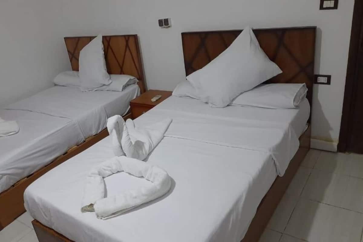 Egyptian cotton sheets, premium bedding, down duvets, memory-foam beds