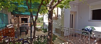Meri- one bedroom apartment with terrace and garden view- near main bus station