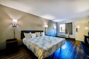 Premium bedding, desk, laptop workspace, iron/ironing board