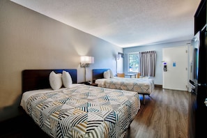 Premium bedding, desk, laptop workspace, iron/ironing board - Studio 6 Extended Stay - Birmingham, AL - Medical Center (Birmingham)