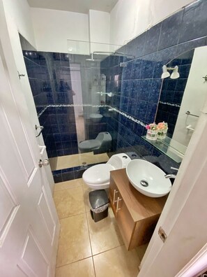 Ducha, toallas y jabón