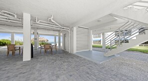 Outdoor dining - Gulf Front 2BR Retreat | Unmatched Views & Iconic Sunsets (Longboat Key)