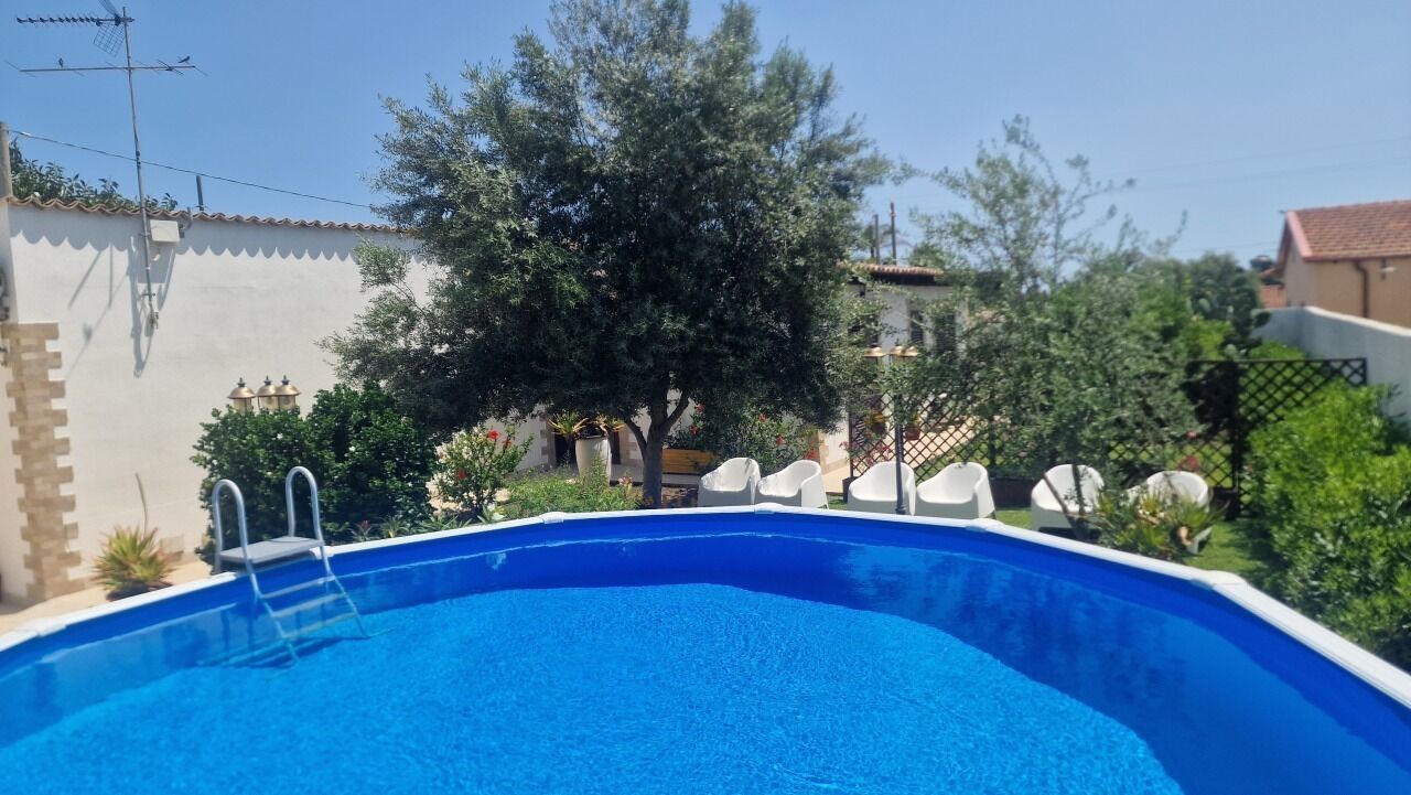 Seasonal outdoor pool, open 10:00 AM to 7:00 PM, pool loungers