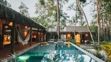 Outdoor pool, open 7:00 AM to 10:00 PM, pool loungers