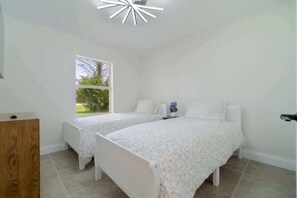 4 bedrooms, iron/ironing board, travel cot, WiFi