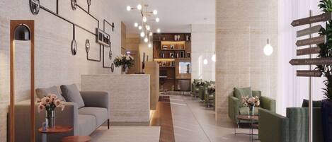 A modern hotel lobby with a central seating area, a reception desk, and directional signs.