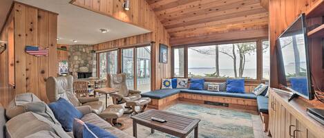 TV, fireplace, books