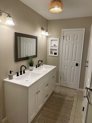 Hair dryer, towels, soap, shampoo