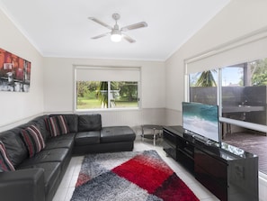 Deluxe 2 Bedroom Cabin | Living area | TV, ping pong - Shoalhaven Heads Village (Shoalhaven Heads)