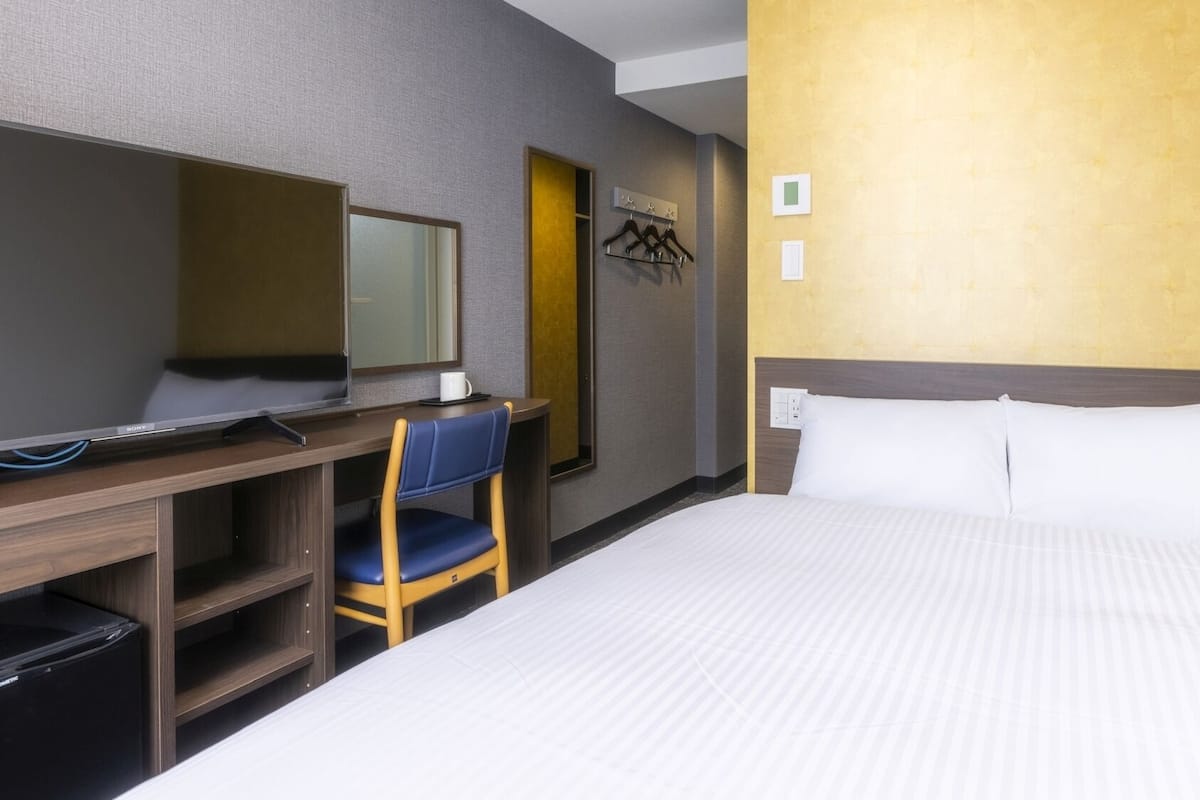 Desk, laptop workspace, blackout curtains, free WiFi