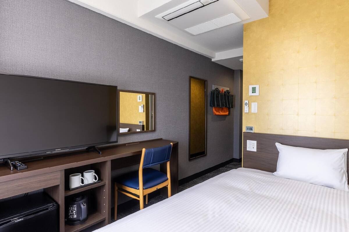 Desk, laptop workspace, blackout curtains, free WiFi