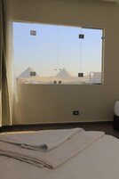 Egyptian cotton sheets, premium bedding, memory-foam beds, minibar