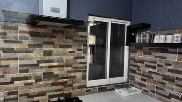 Microwave, dining tables, kitchen islands