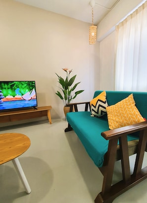 Departamento Prestigio | Área de sala de estar | Smart TV de 40 pulgadas con canales digitales, televisión y Netflix 