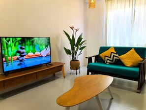 Signature Apartment | Living area | 40-inch Smart TV with digital channels, TV, Netflix - Cloth Art Homestay near Jonker&Pahlawan (Malacca City)