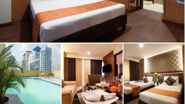 A hotel room with a large bed, a wardrobe, and a bathroom. - Fernandina 88 Suites Residences (Quezon City)