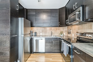 Fridge, microwave, oven, stovetop - Renovated 3BR Character Home in the heart of Calgary (Calgary)