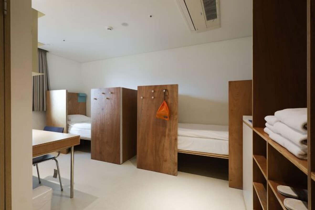 Premium bedding, memory foam beds, desk, laptop workspace