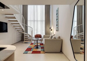 Estudio, 1 cama King size | Área de sala de estar | Smart TV de 55 pulgadas con canales vía satélite y televisión 