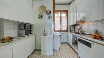 Family House, Multiple Bedrooms, Mountainside (La Finestra Sul Lago) | Private kitchen | Fridge, microwave, oven, stovetop