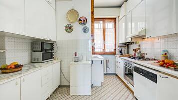 Family House, Multiple Bedrooms, Mountainside (La Finestra Sul Lago) | Private kitchen | Fridge, microwave, oven, stovetop