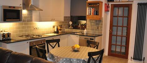 Fridge, dishwasher, cookware/dishes/utensils