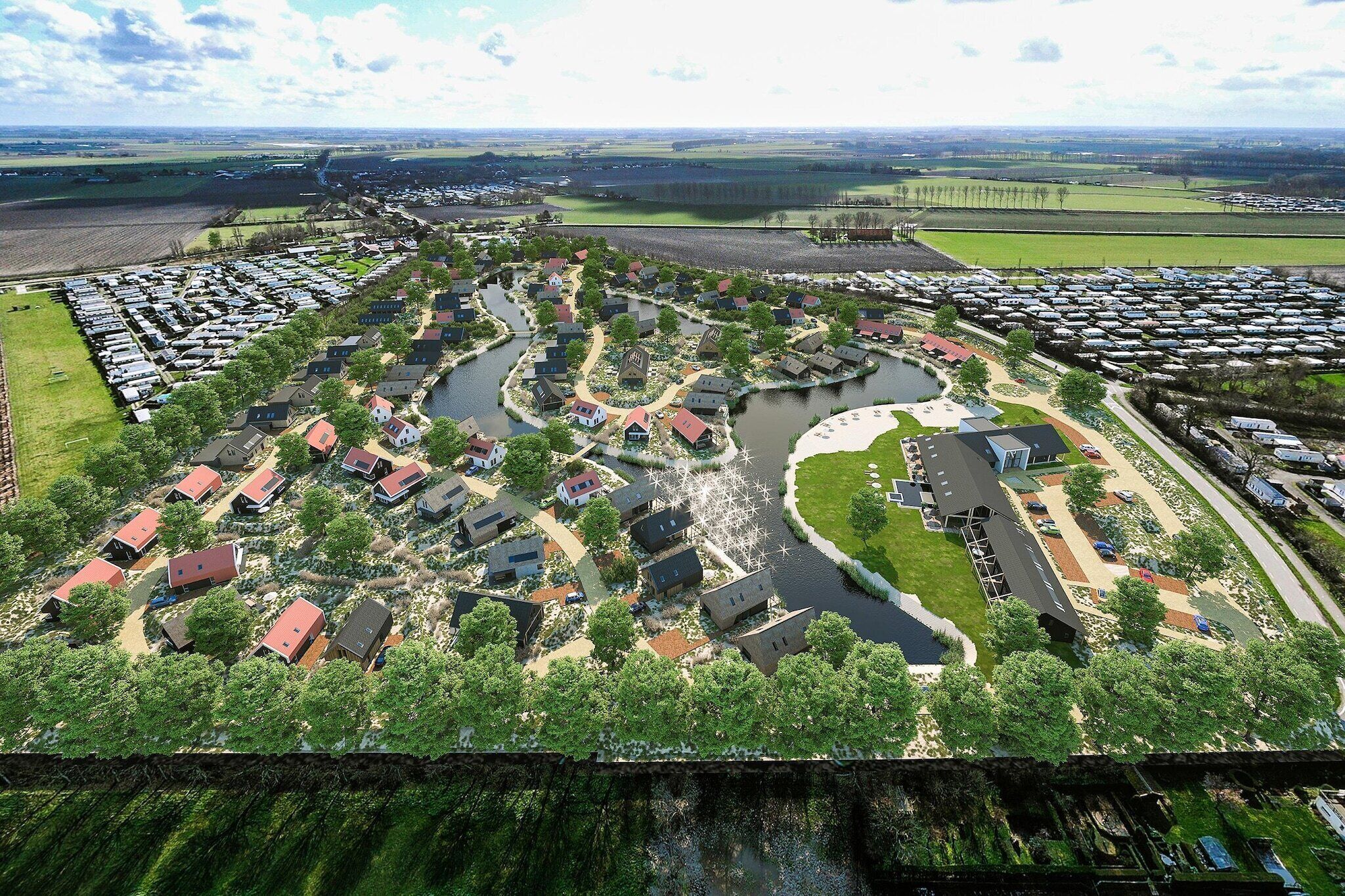 Vue aérienne d’un quartier résidentiel où les maisons sont disposées autour d’un élément aquatique central, et reliées par des allées.