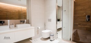 Hair dryer, towels, soap, shampoo