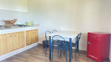 Leilighet – standard, privat bad, hageutsikt (Appartamento Matrimoniale) | Spiseområde